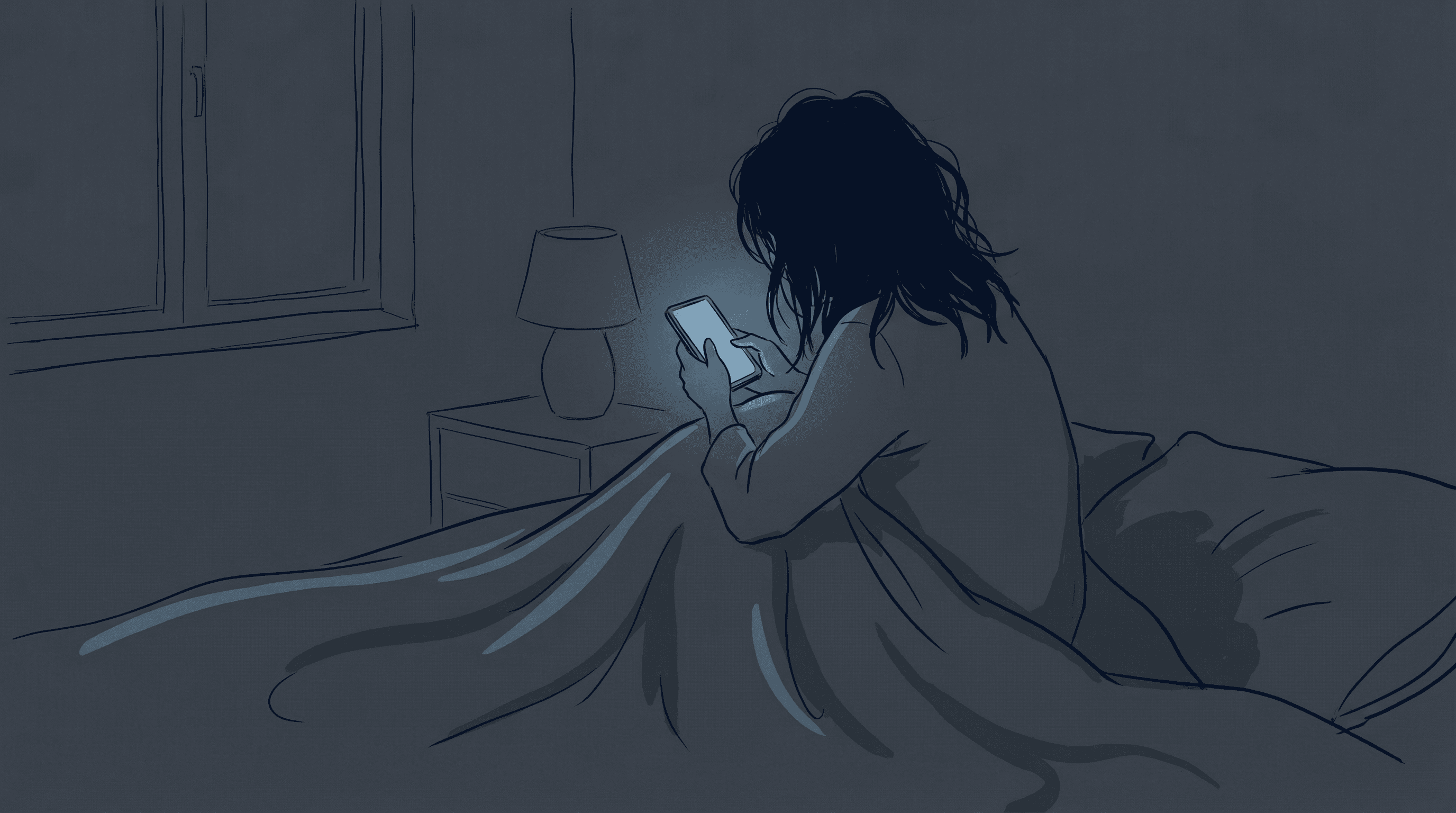 孤独な夜にスマホを見る女性